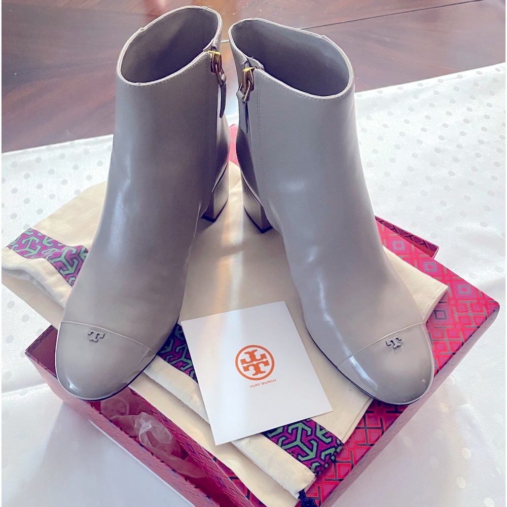 Tory Burch ankle boots in color Dust Storm. Never worn with Duster bag and box.